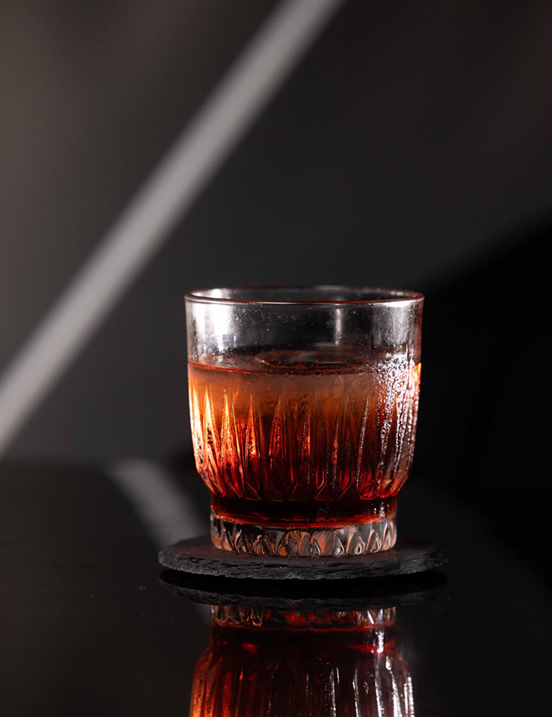 Professional bartender preparing cocktails for contact consultation