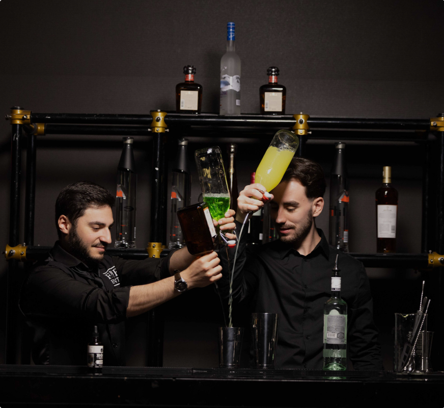 Professional bartender preparing cocktails at elegant event