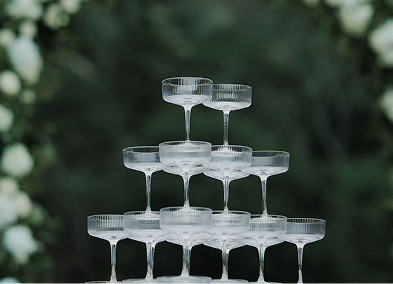Elegant cocktail setup with premium spirits and professional bartending equipment